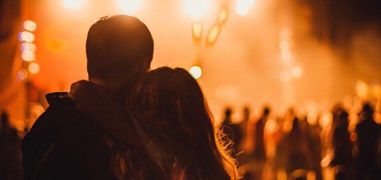 A beautiful shot of a couple during the concert